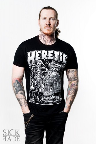 Black unisex SickFace T-shirt with skeleton burning church design titled “Heretic without a cause”.
